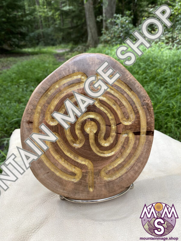 Large Brigid Style labyrinth sculpture standing outdoors